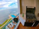 Outdoor grill on balcony.